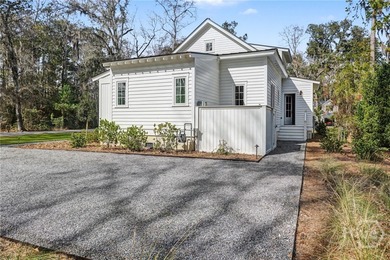 This stunning, brand-new Lowcountry cottage features 4 bedrooms - photo 6