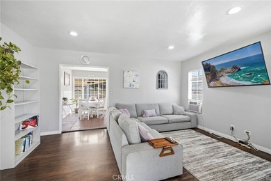 Nestled on a quiet tree lined street in North Long Beach, this - photo 8
