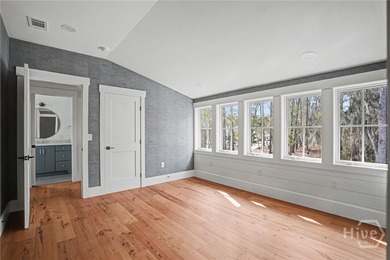 This stunning, brand-new Lowcountry cottage features 4 bedrooms - photo 9