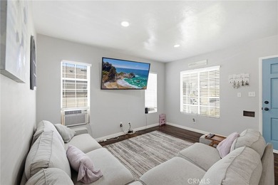 Nestled on a quiet tree lined street in North Long Beach, this - photo 10
