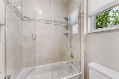 Nestled within the prestigious Woodfield Country Club, this - photo 33