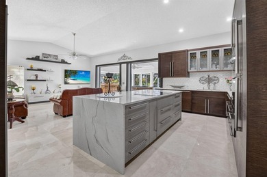 Beautifully updated 4BR/3BA pool home w/long lake views in - photo 10