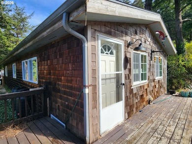 Enjoy coastal living in this charming 3 bedroom, 2 bathroom home - photo 2