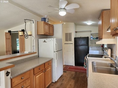 Enjoy coastal living in this charming 3 bedroom, 2 bathroom home - photo 8