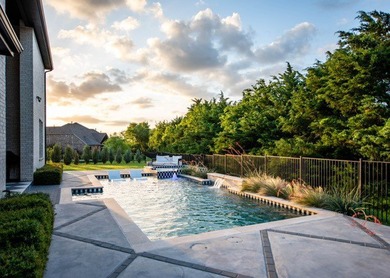Welcome to luxury living in the prestigious lakeside community - photo 3