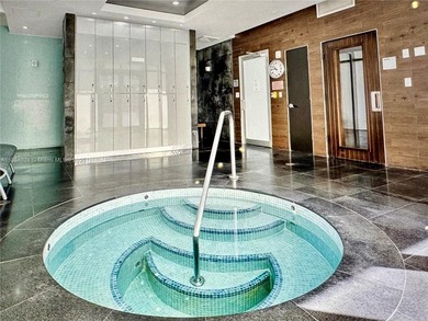 Stunning 1-Bedroom Condo with City & Water Views in the Heart of