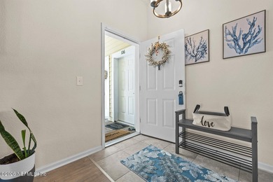 This meticulously maintained retreat is perfectly positioned - photo 9