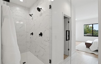Architecturally striking, modern three-story townhome offering - photo 12