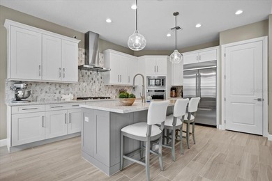 Welcome to refined luxury in the prestigious Watermark at Avenir - photo 18