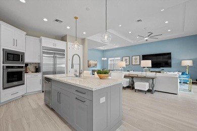 Welcome to refined luxury in the prestigious Watermark at Avenir - photo 19