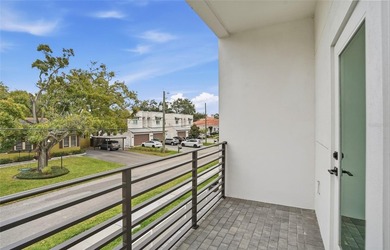 Architecturally striking, modern three-story townhome offering - photo 22