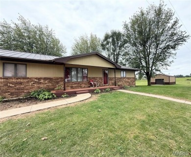 Explore this charming ranch home on 3 acres in a quiet small