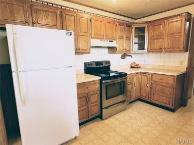 Explore this charming ranch home on 3 acres in a quiet small