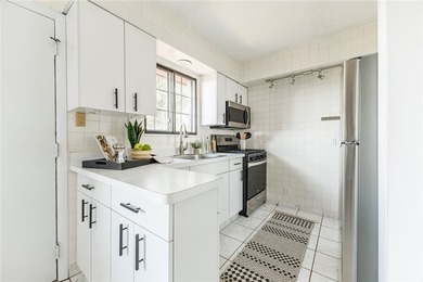 Move-in ready, low-maintenance living awaits! Welcome to 8 - photo 11