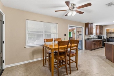 Welcome home to this lovingly maintained 4-bedroom, 2-bathroom - photo 11