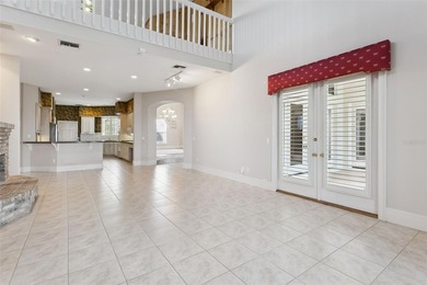 Experience exceptional lakefront living in this custom-built - photo 12