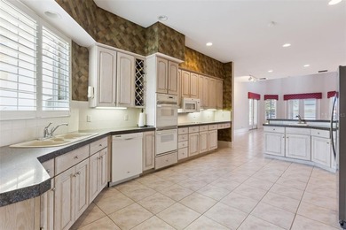 Experience exceptional lakefront living in this custom-built - photo 13