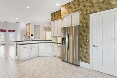 Experience exceptional lakefront living in this custom-built - photo 14
