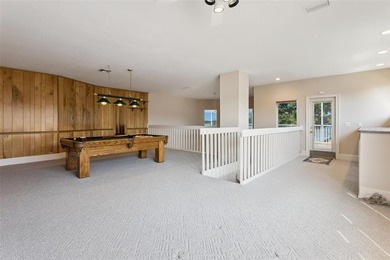 Experience exceptional lakefront living in this custom-built - photo 16
