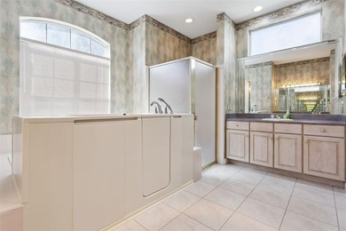 Experience exceptional lakefront living in this custom-built - photo 23