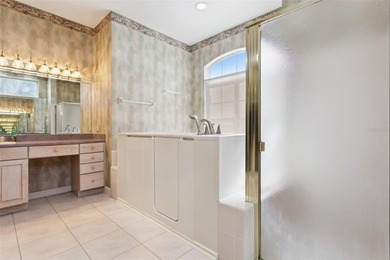 Experience exceptional lakefront living in this custom-built - photo 24