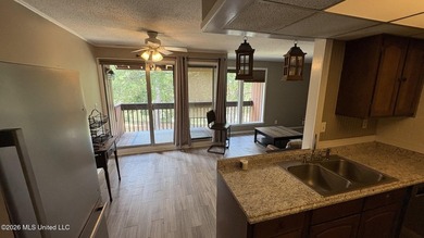 One bedroom, one bathroom, second floor condo for sale with - photo 4