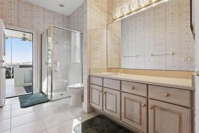 Experience exceptional lakefront living in this custom-built - photo 26