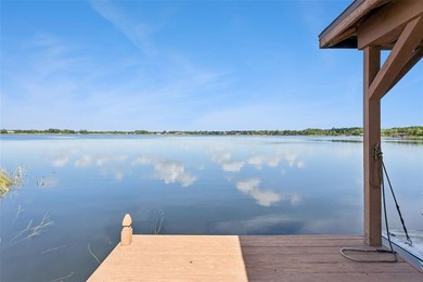 Experience exceptional lakefront living in this custom-built - photo 41