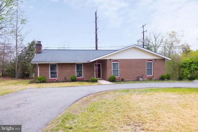 Welcome to this charming 4-bedroom, 2-bathroom rambler nestled - photo 1