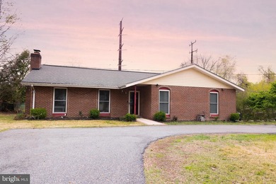 Welcome to this charming 4-bedroom, 2-bathroom rambler nestled - photo 2