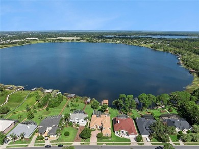 Experience exceptional lakefront living in this custom-built - photo 49