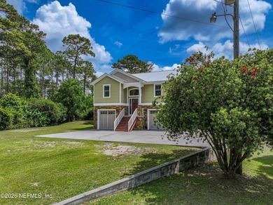 3.42 acres along scenic Pellicer Creek, extensively renovated in - photo 3