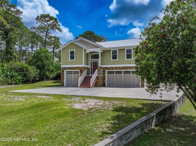3.42 acres along scenic Pellicer Creek, extensively renovated in - photo 4