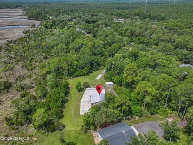 3.42 acres along scenic Pellicer Creek, extensively renovated in - photo 7