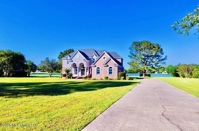 Experience refined lakefront living in this stunning - photo 3