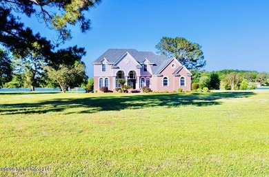 Experience refined lakefront living in this stunning - photo 4