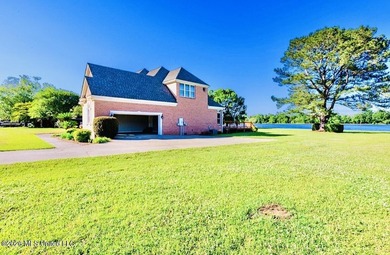 Experience refined lakefront living in this stunning - photo 5