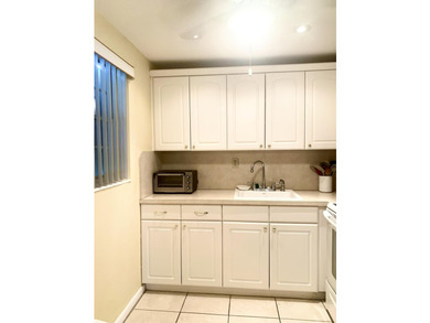 Welcome to this charming rare 1st floor corner, 2 bedroom, 2 - photo 8