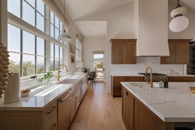 Architecturally stunning and built for entertaining, this rare - photo 12