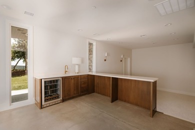 Architecturally stunning and built for entertaining, this rare - photo 22