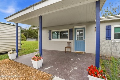 Welcome to 154 Polk Rd - a charming concrete block home situated - photo 4