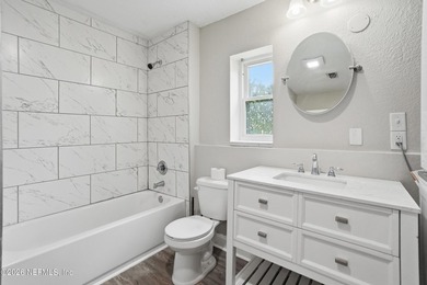 Welcome to 154 Polk Rd - a charming concrete block home situated - photo 5