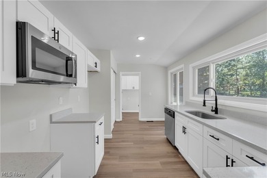 Beautifully updated and move-in ready ranch-style slab is - photo 14