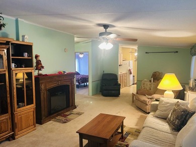 This well-furnished double wide home is perfectly situated on a - photo 4