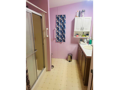 This well-furnished double wide home is perfectly situated on a - photo 5