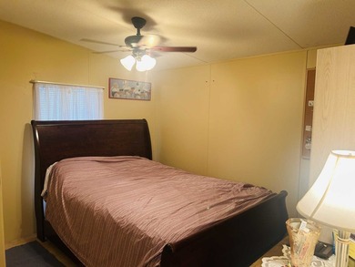 This well-furnished double wide home is perfectly situated on a - photo 7