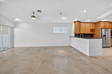 Welcome to this charming single-story residence in Palm Isles - photo 6