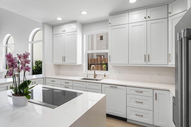 Completely renovated, this beautifully reimagined residence - photo 8