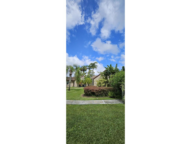 Welcome to this charming two-bedroom, two-bathroom villa in the - photo 4