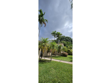 Welcome to this charming two-bedroom, two-bathroom villa in the - photo 5